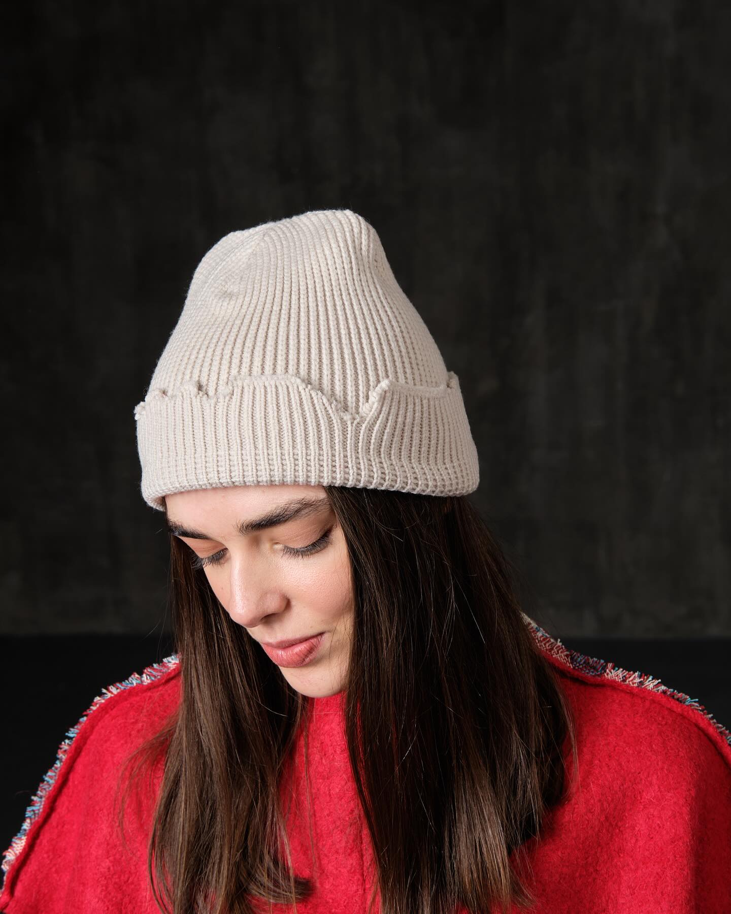 The raps cap is torn, light gray