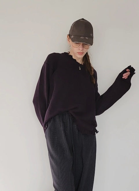 Reworked black cotton sweater with denim sleeves