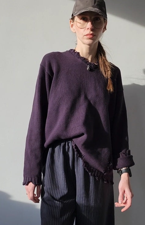 Reworked black cotton sweater with denim sleeves