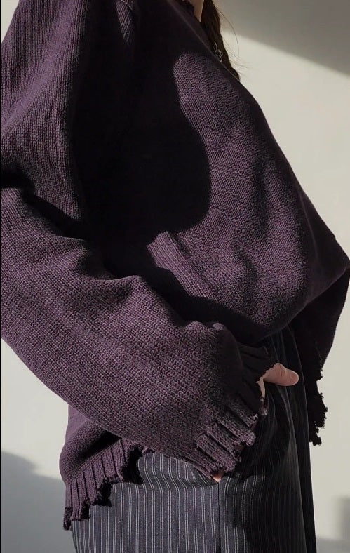 Reworked black cotton sweater with denim sleeves