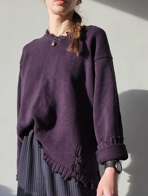 Reworked black cotton sweater with denim sleeves