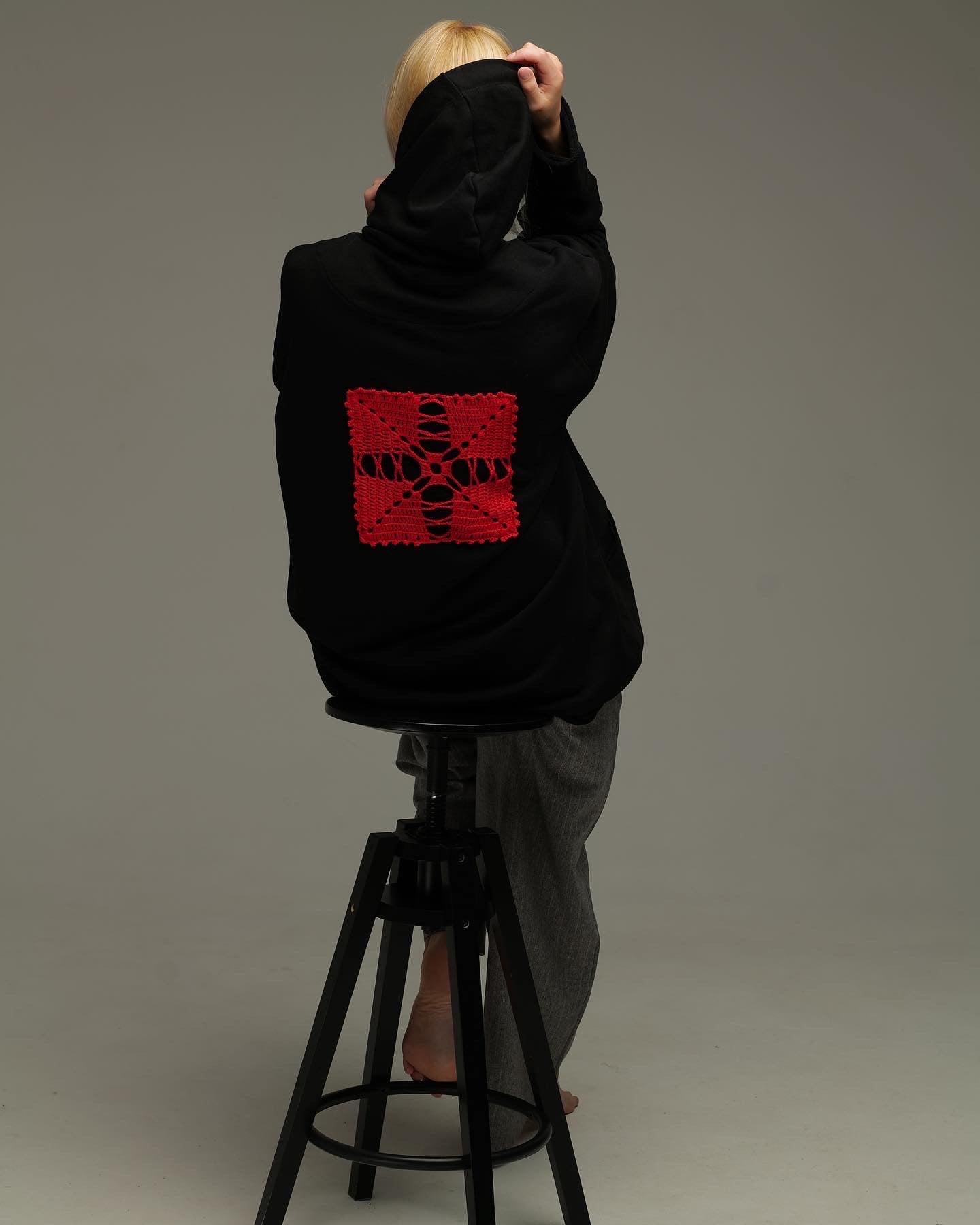 Black oversize hoodie with ethnic decoration