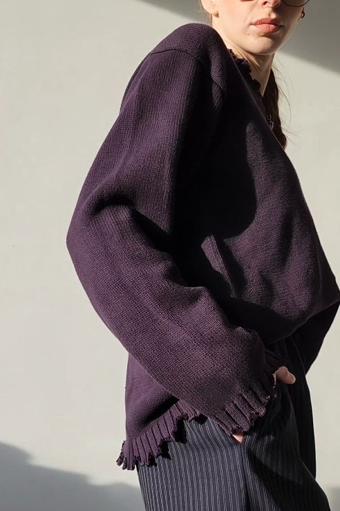 Reworked black cotton sweater with denim sleeves