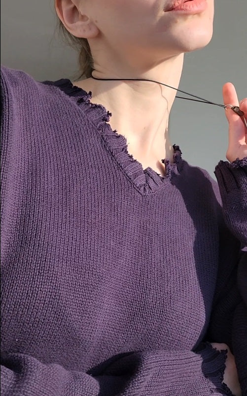 Reworked black cotton sweater with denim sleeves