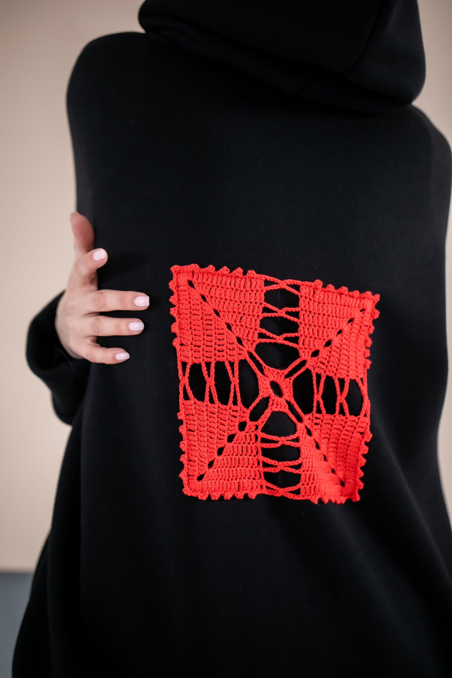 Black oversize hoodie with ethnic decoration