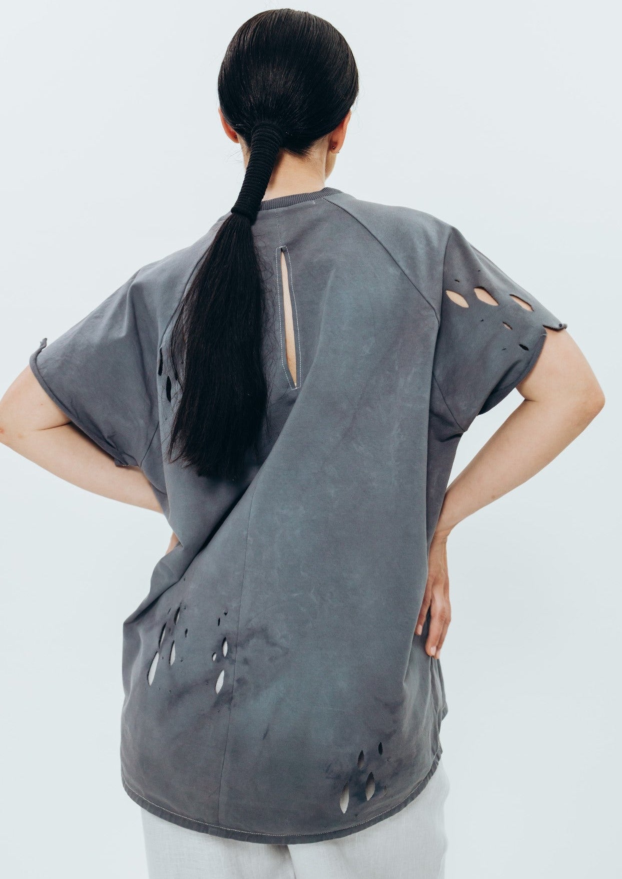 Hand-dyed graphite T-shirt with perforations