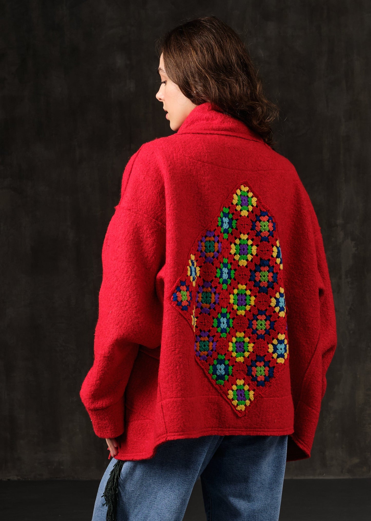Bomber made of wool with decoration on the back in colors