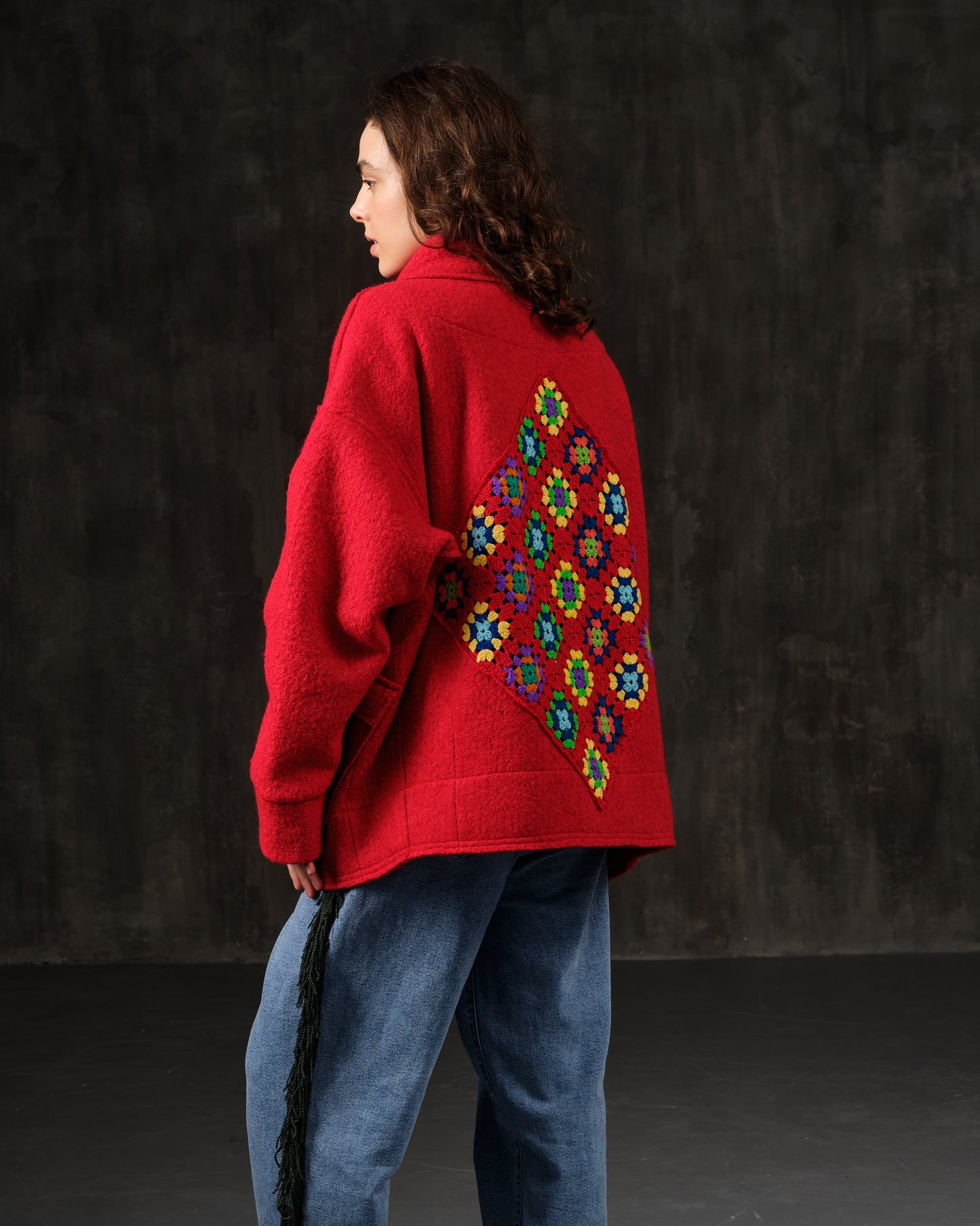 Bomber made of wool with decoration on the back in colors