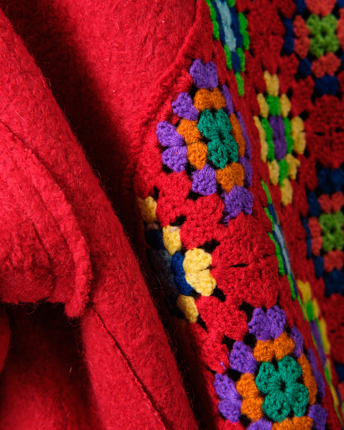 Bomber made of wool with decoration on the back in colors