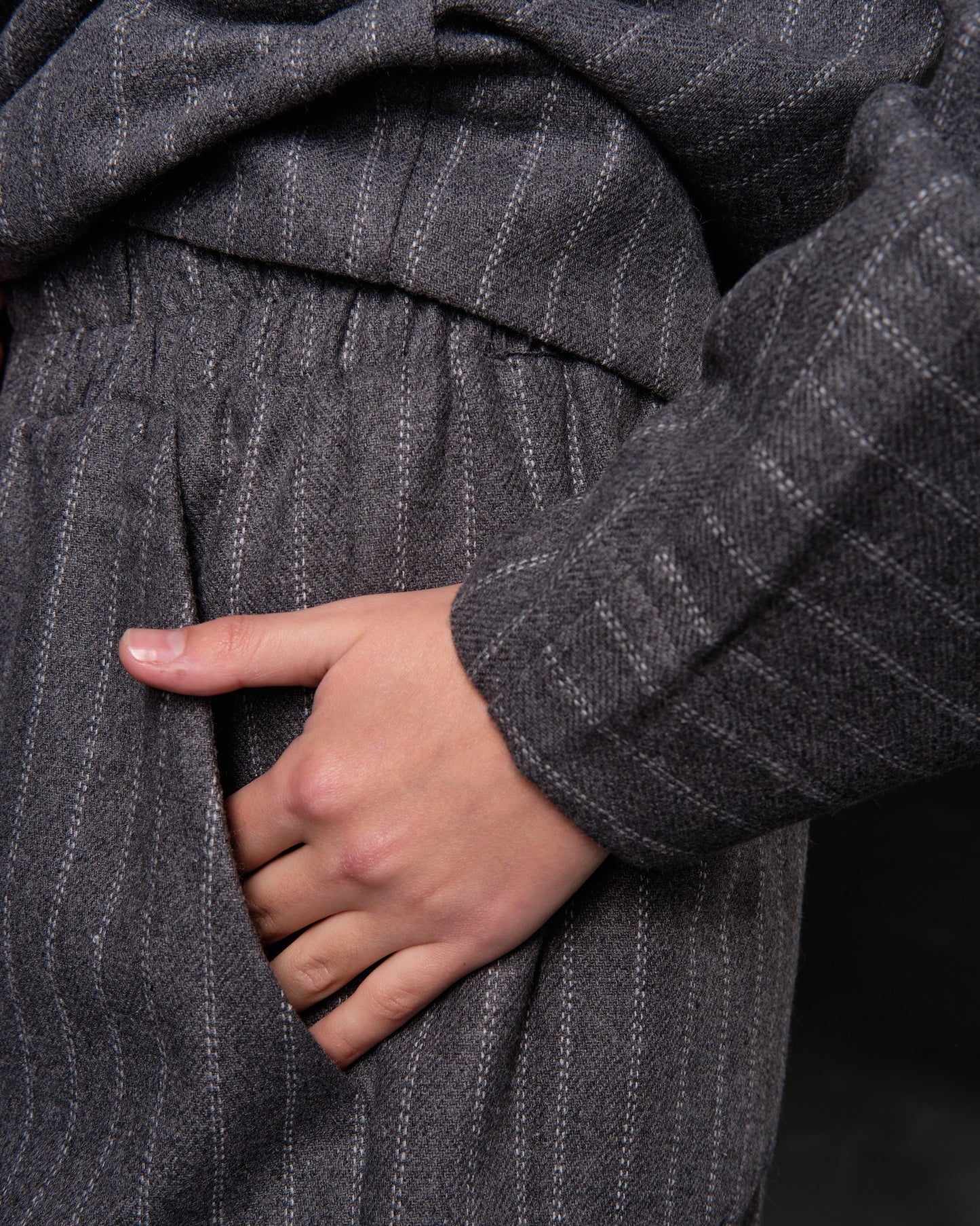 A suit of woolen pants with a shirt-skinny gray in stripes