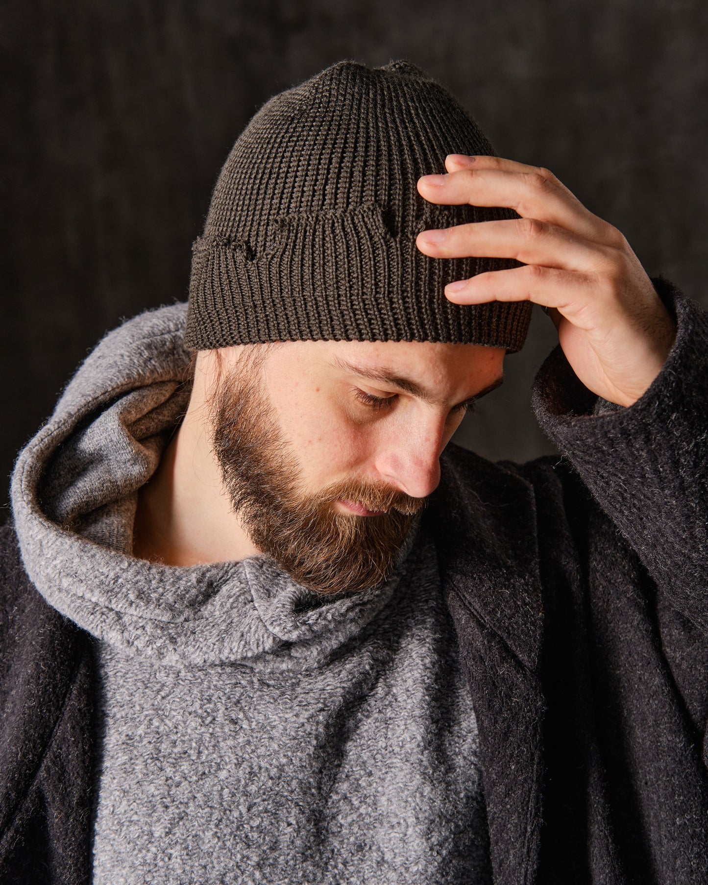 The raps cap is torn, light gray