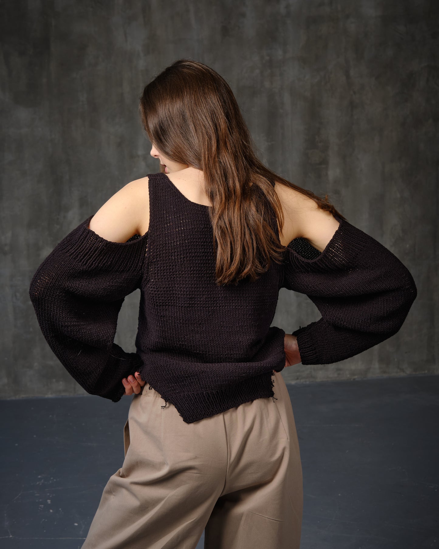 Black cotton sweater with open shoulders