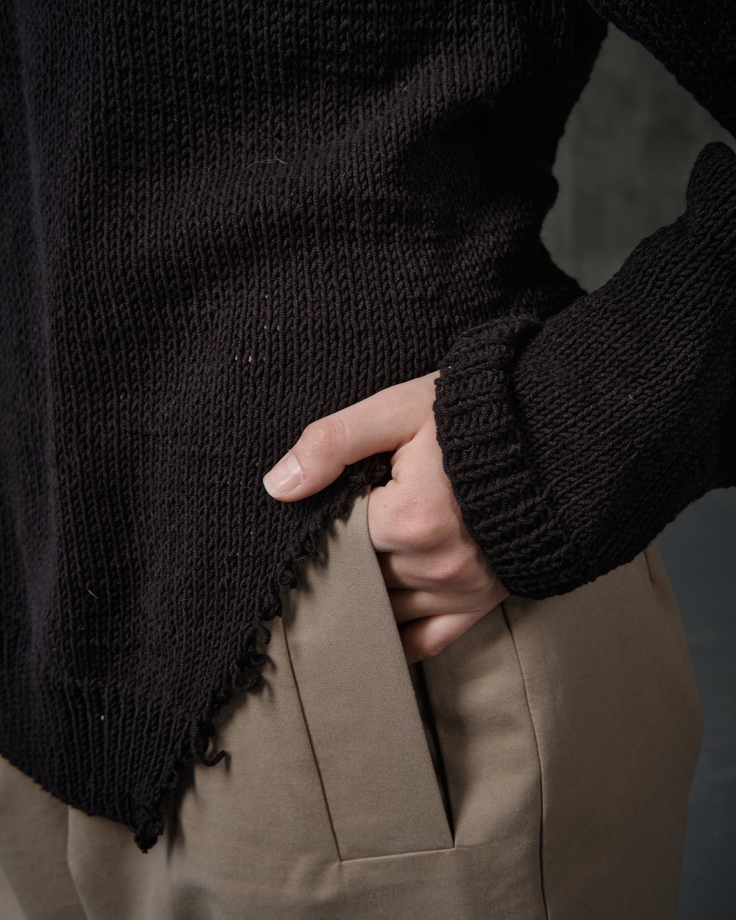 Black cotton sweater with open shoulders