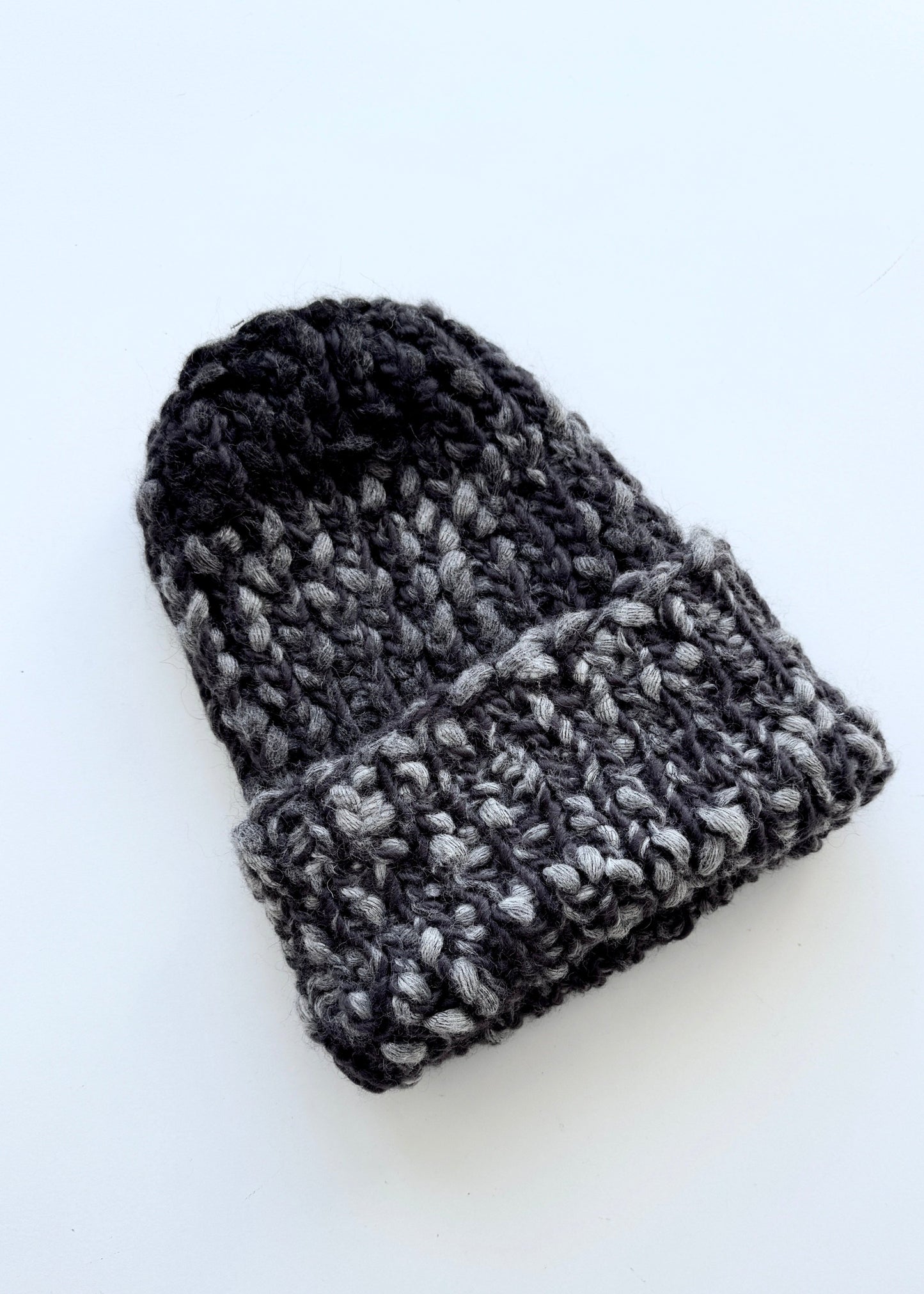 A bouclé wool hat with a lapel