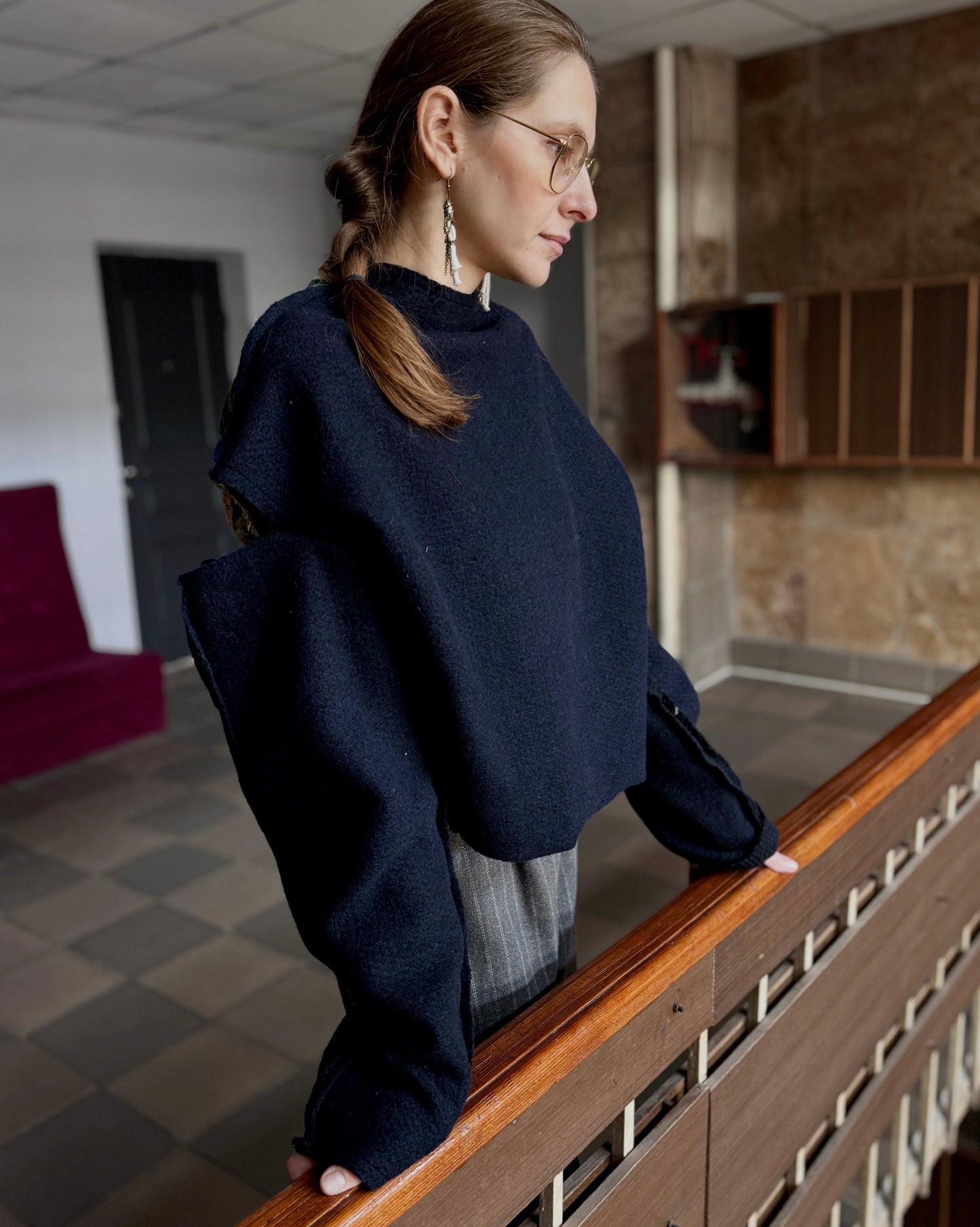 Blue wool sweater, open shoulders, with rose jacquard
