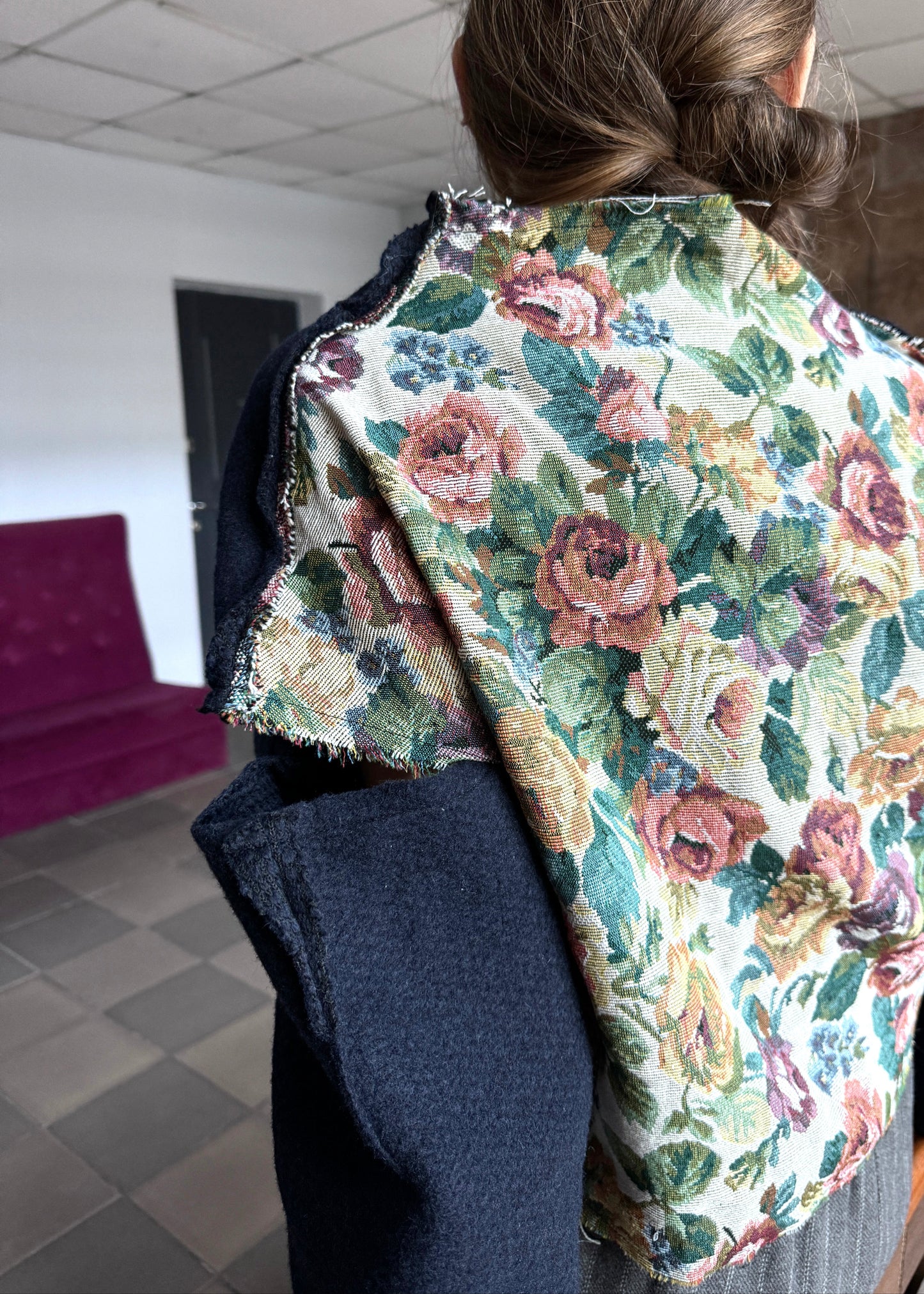 Blue wool sweater, open shoulders, with rose jacquard