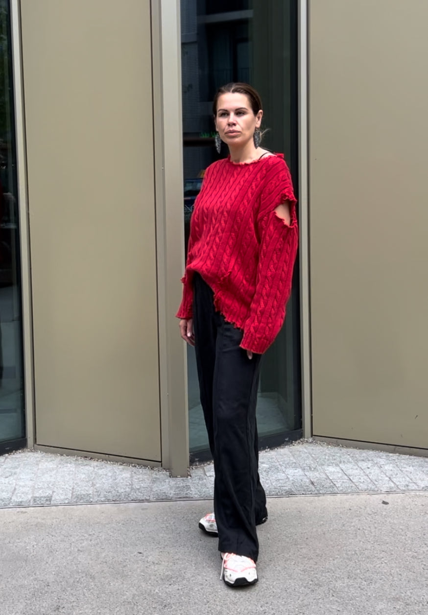 Reworked black cotton sweater with denim sleeves