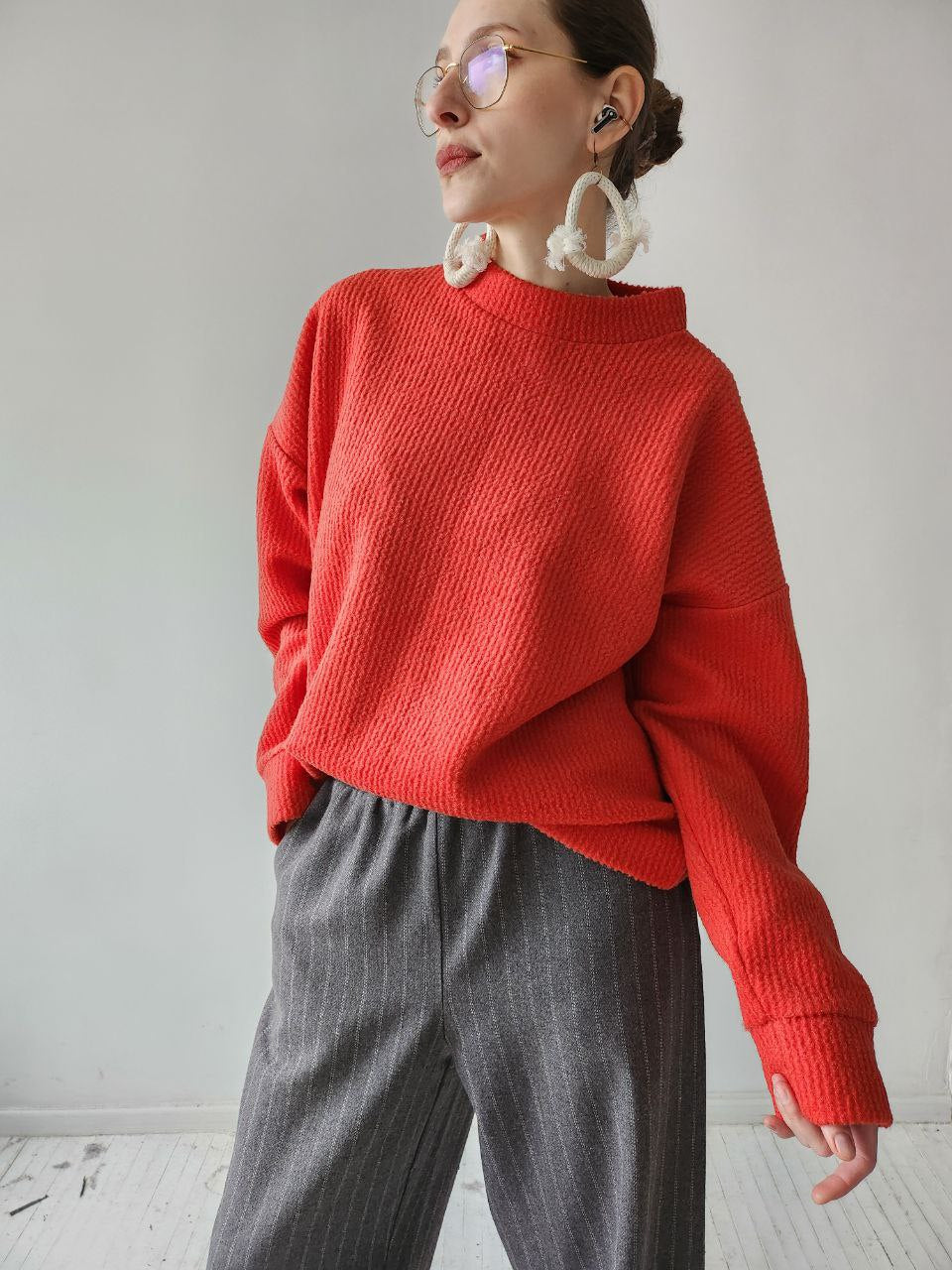 Orange-red textile trapeze sweater