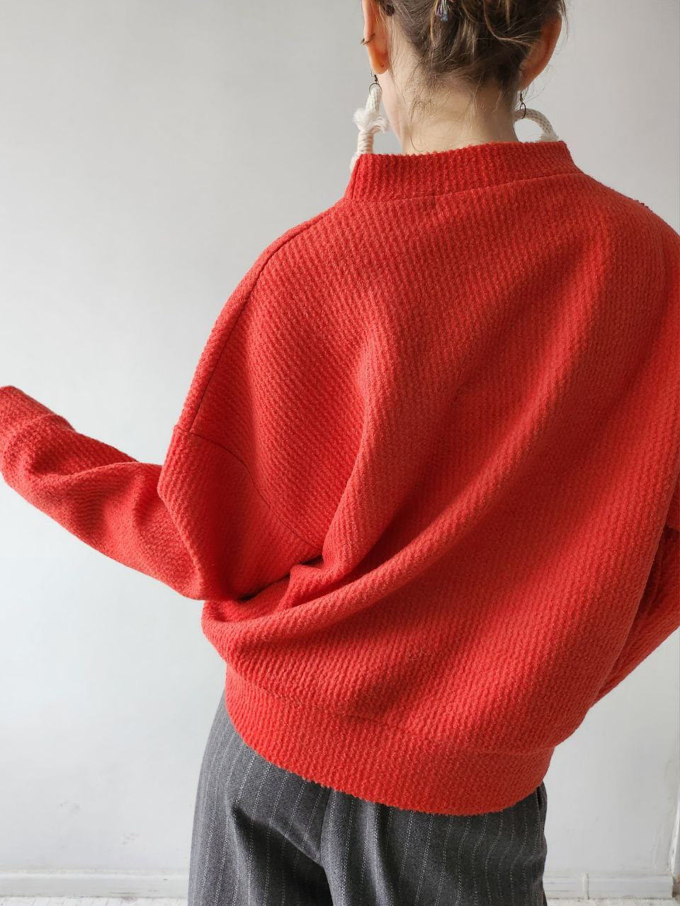 Orange-red textile trapeze sweater