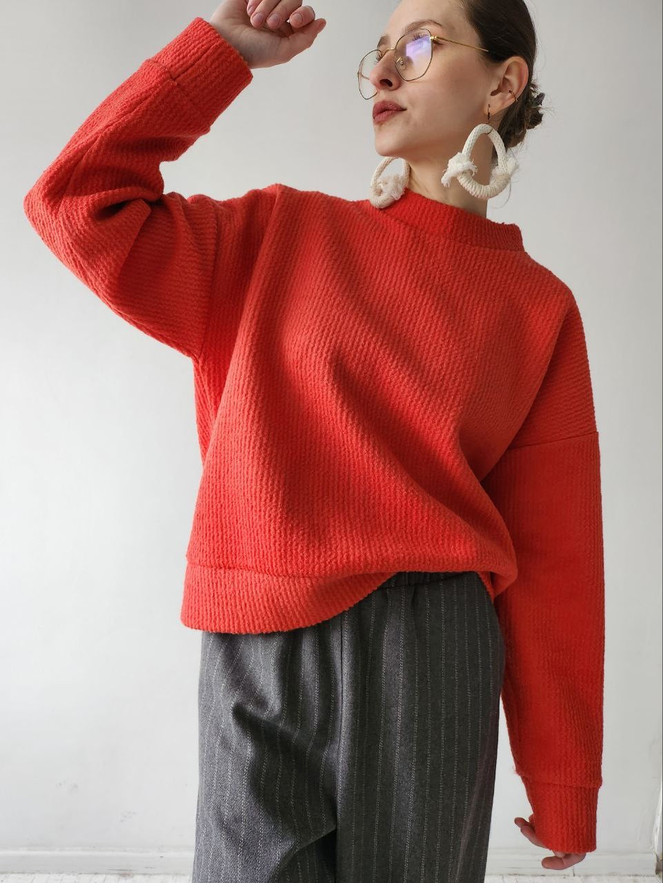 Orange-red textile trapeze sweater
