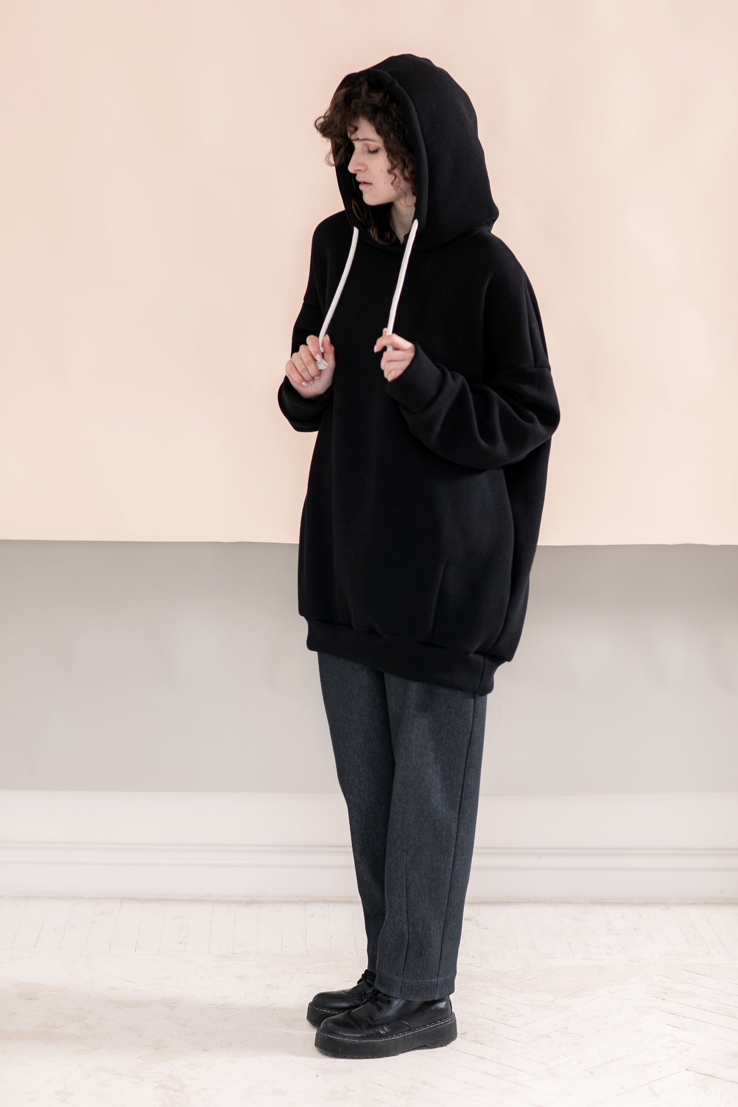 Black oversize hoodie with ethnic decoration