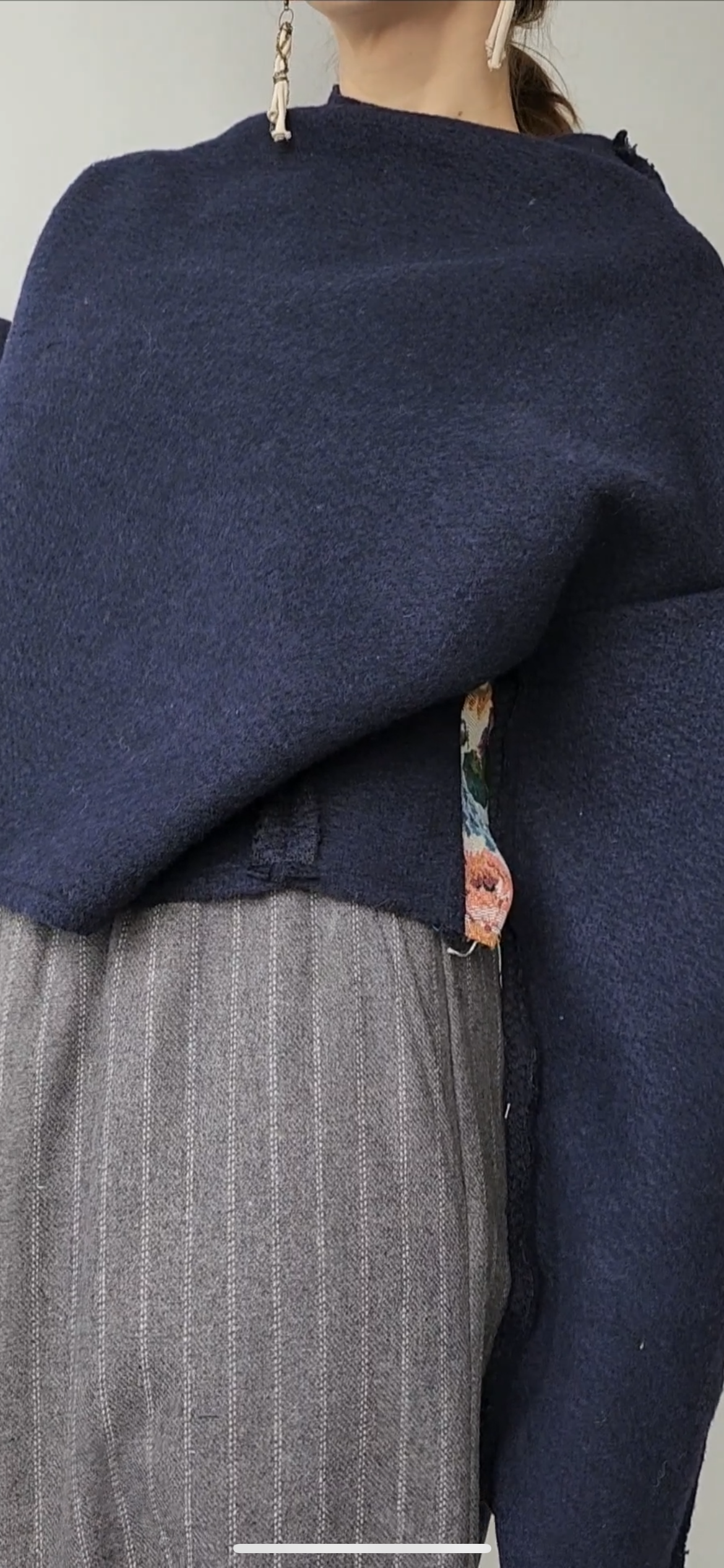 Blue wool sweater, open shoulders, with rose jacquard
