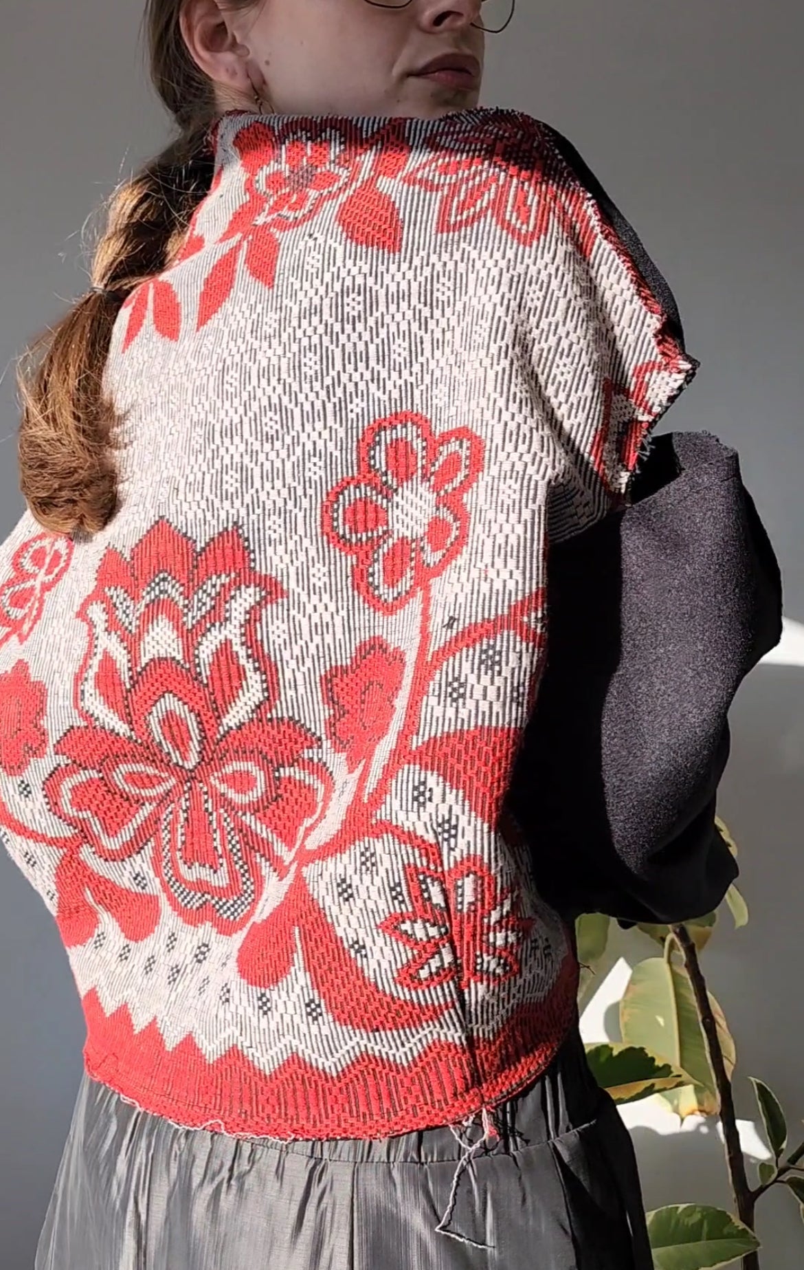 Black wool sweater with open shoulders and vintage floral jacquard
