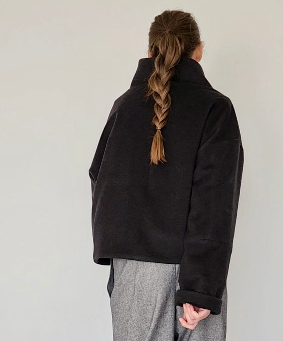 Short black wool coat with zipper