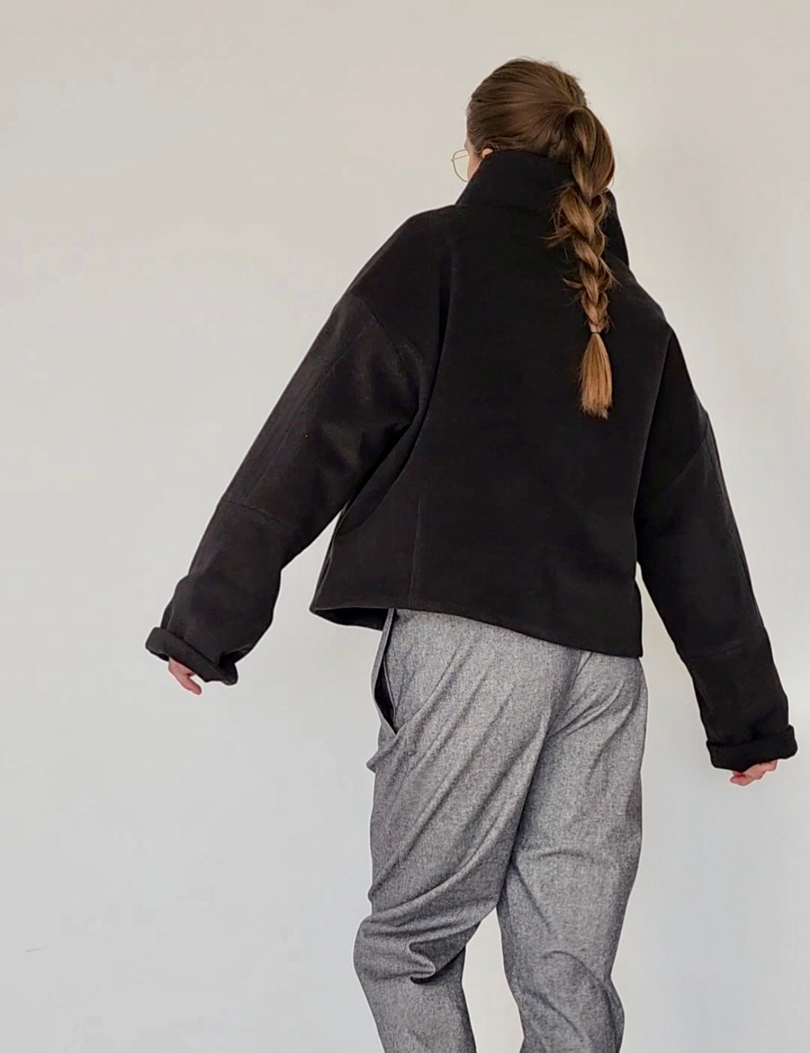 Short black wool coat with zipper