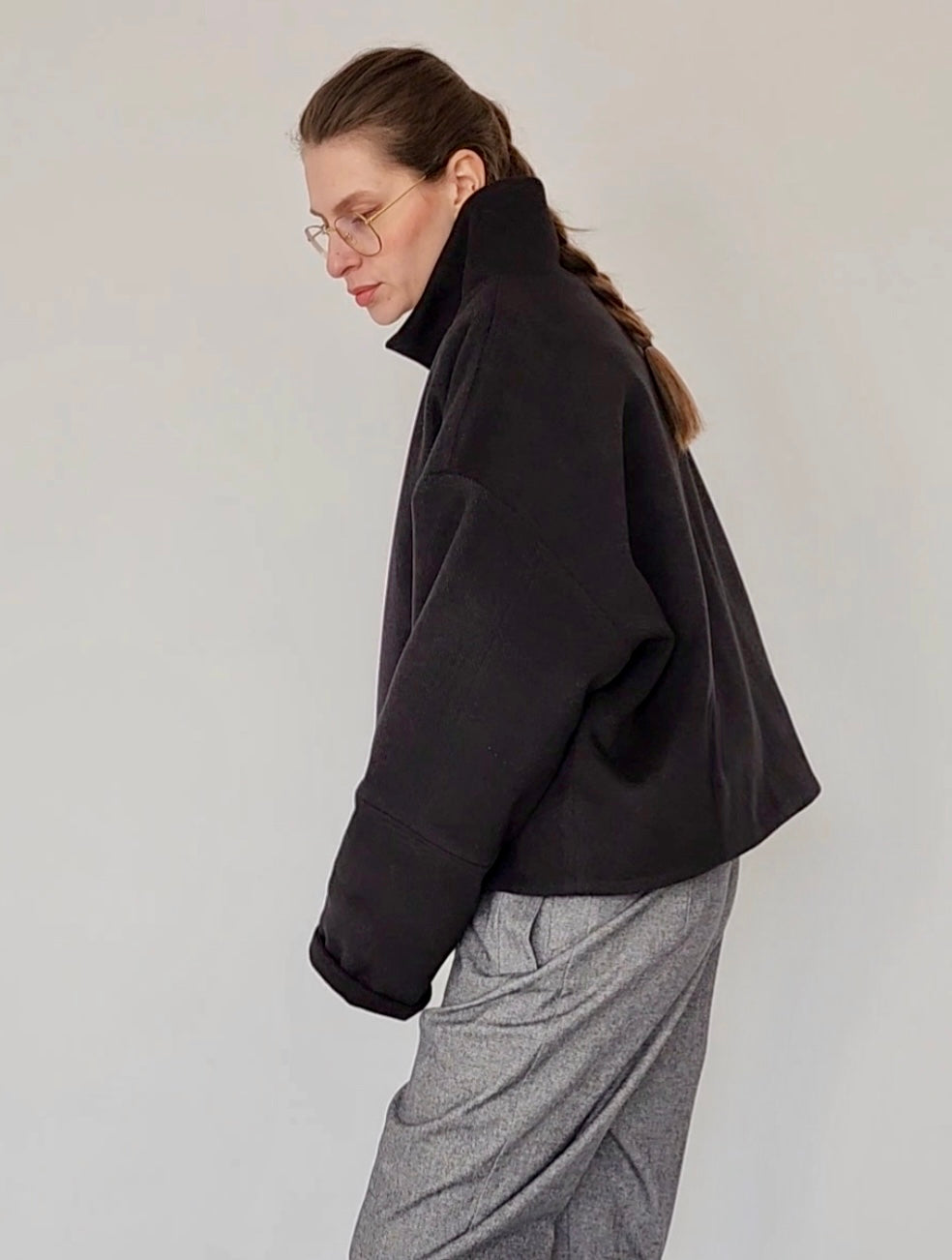 Short black wool coat with zipper