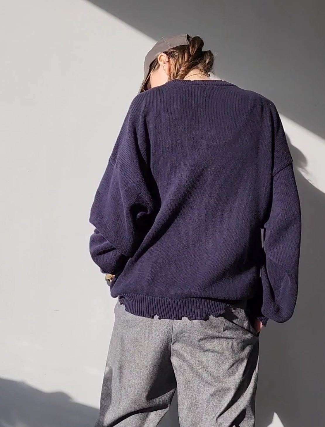 Reworked black cotton sweater with denim sleeves