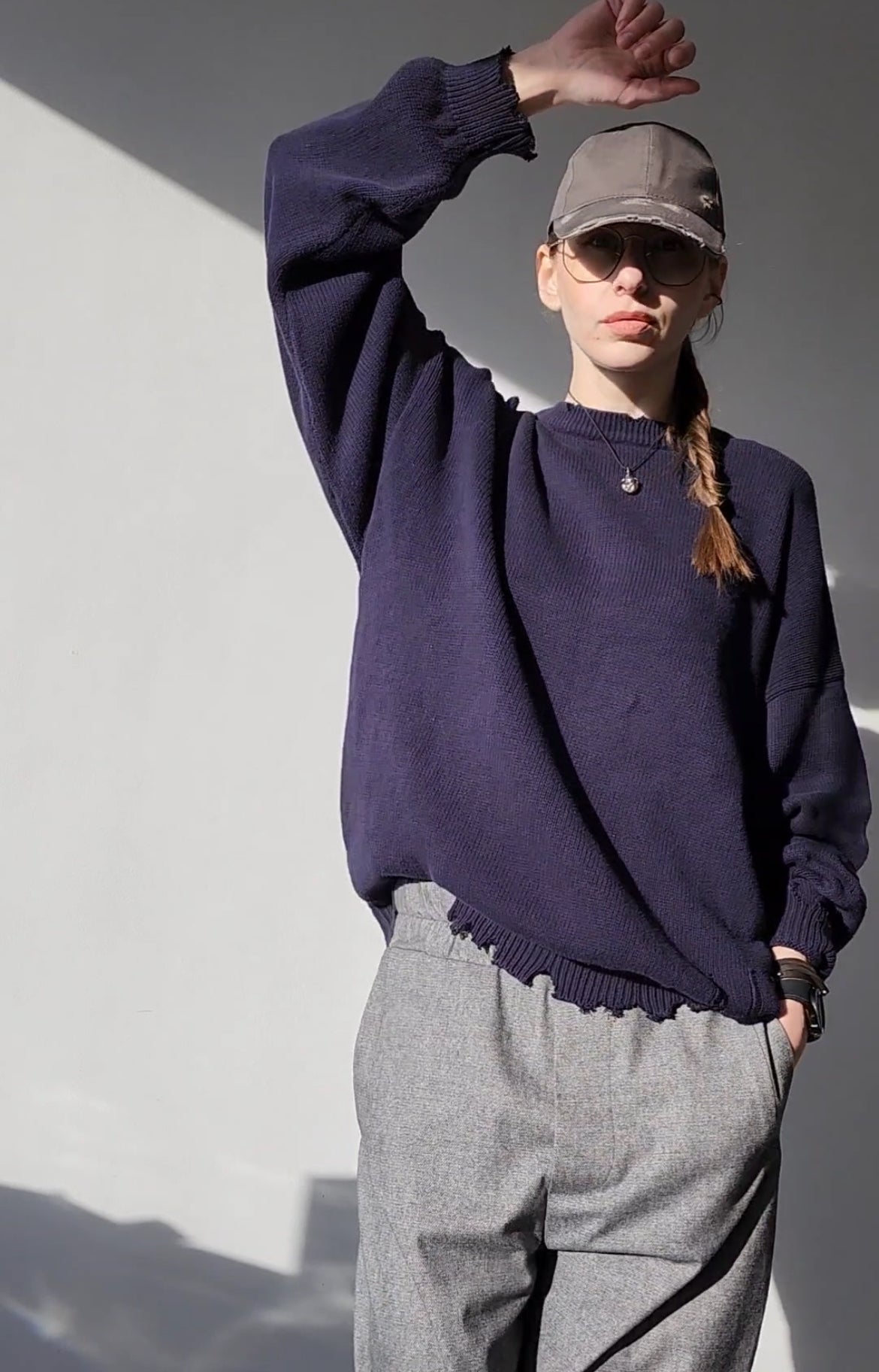 Reworked black cotton sweater with denim sleeves