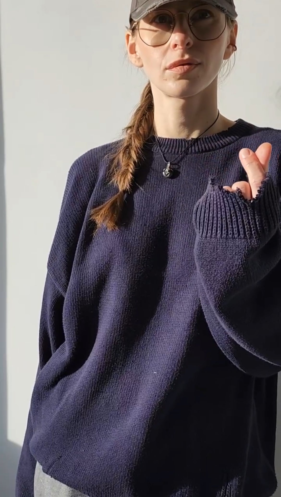 Reworked black cotton sweater with denim sleeves