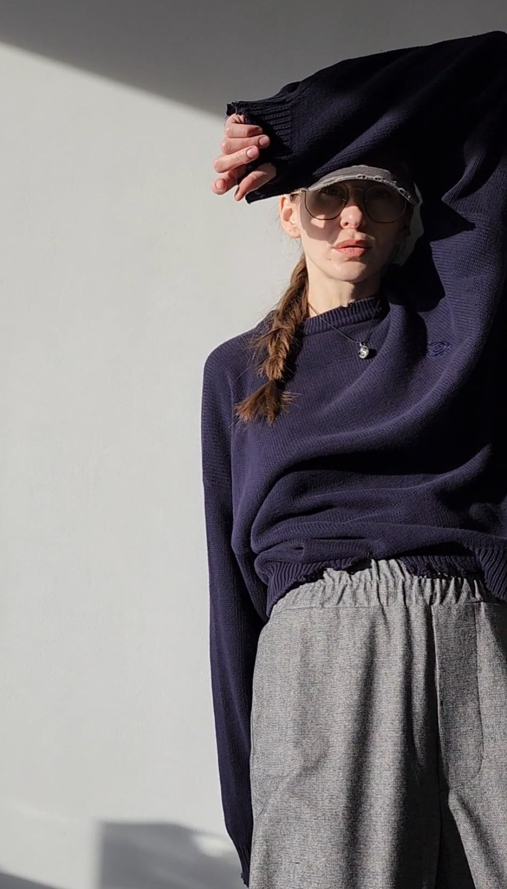 Reworked black cotton sweater with denim sleeves