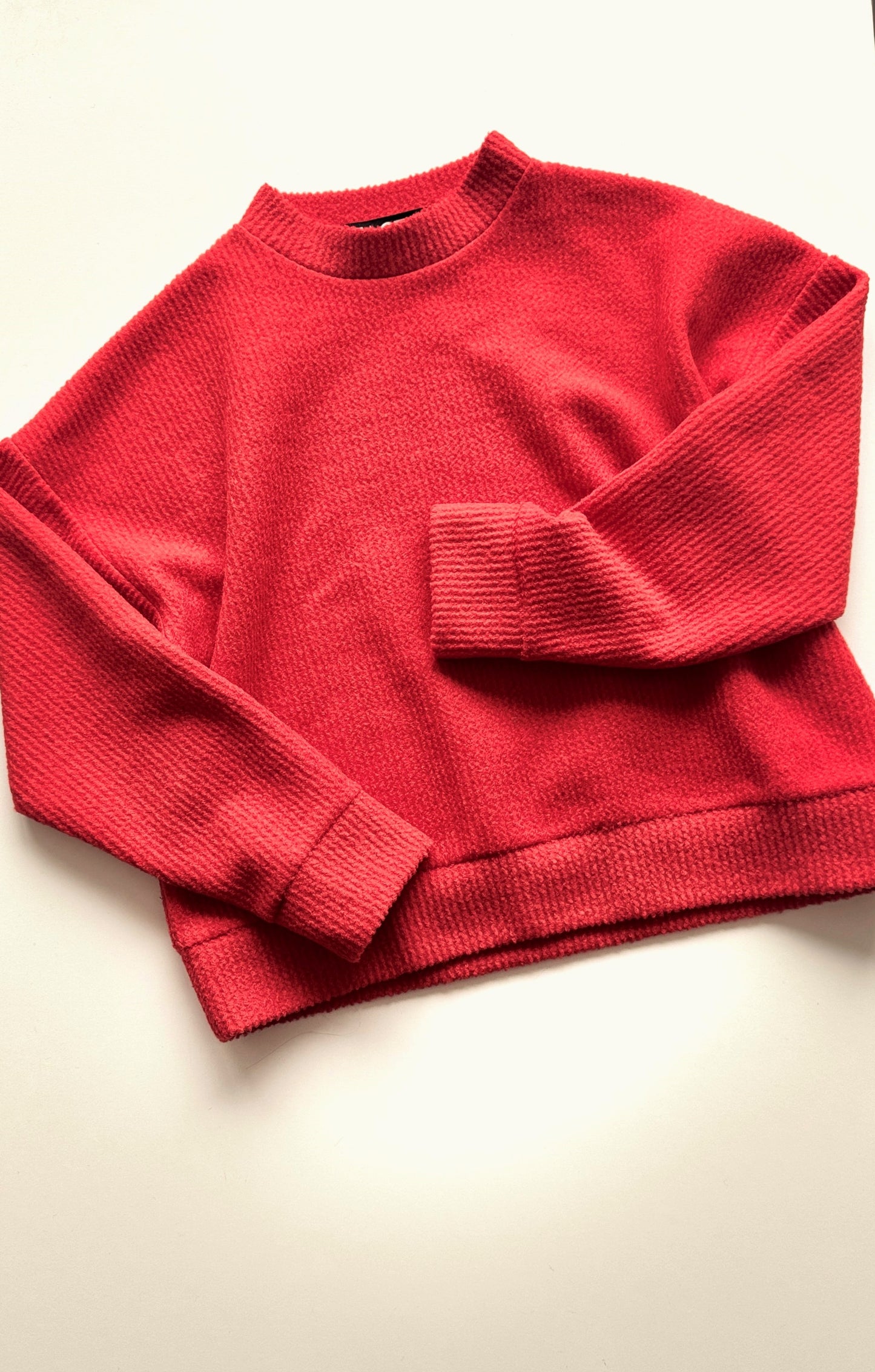 Orange-red textile trapeze sweater