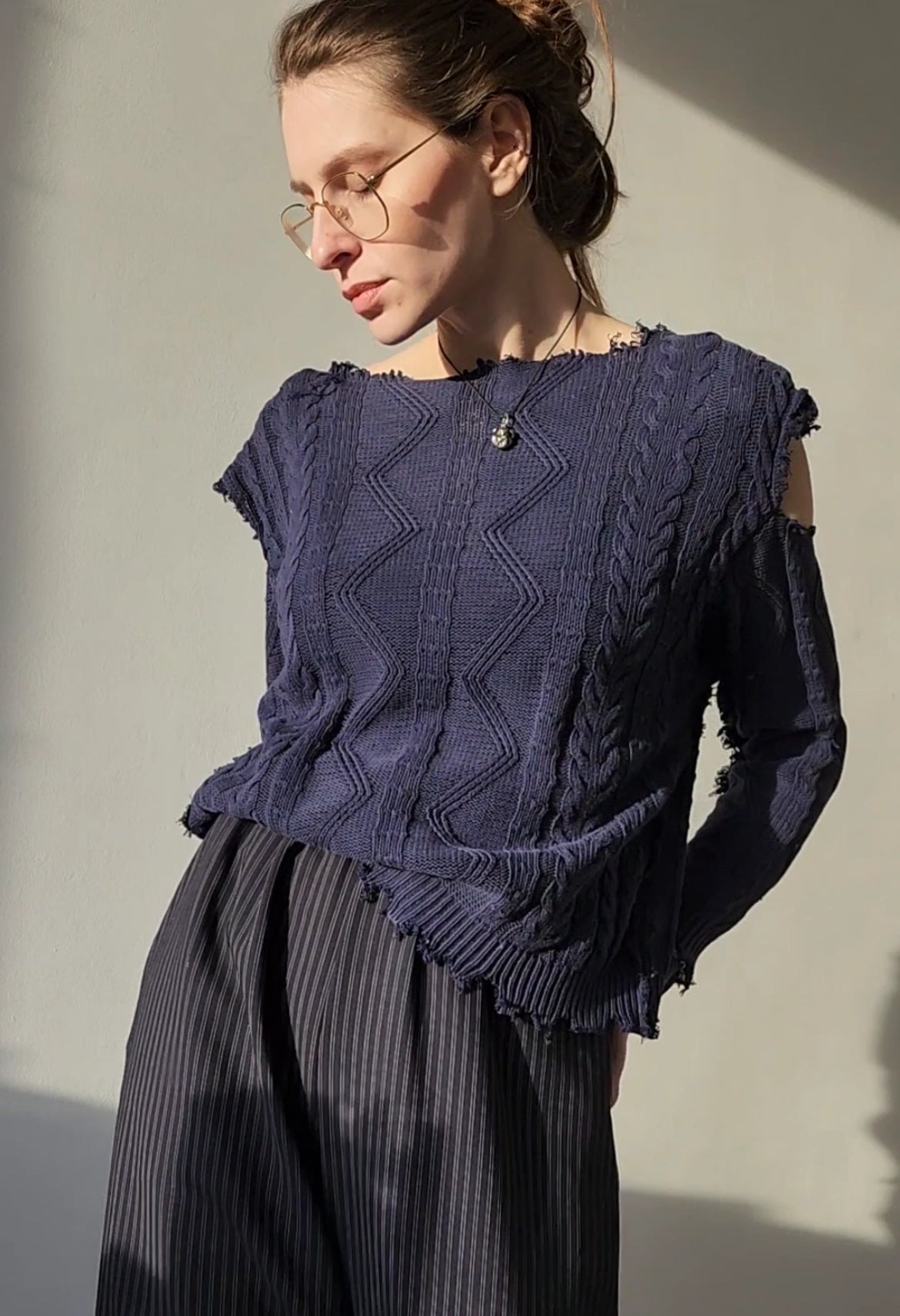 Reworked black cotton sweater with denim sleeves