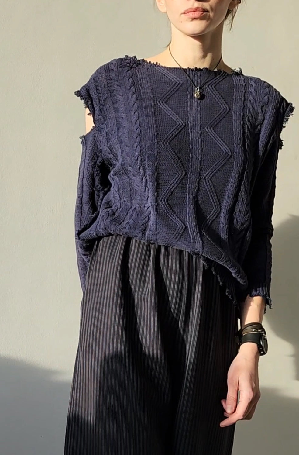 Reworked black cotton sweater with denim sleeves