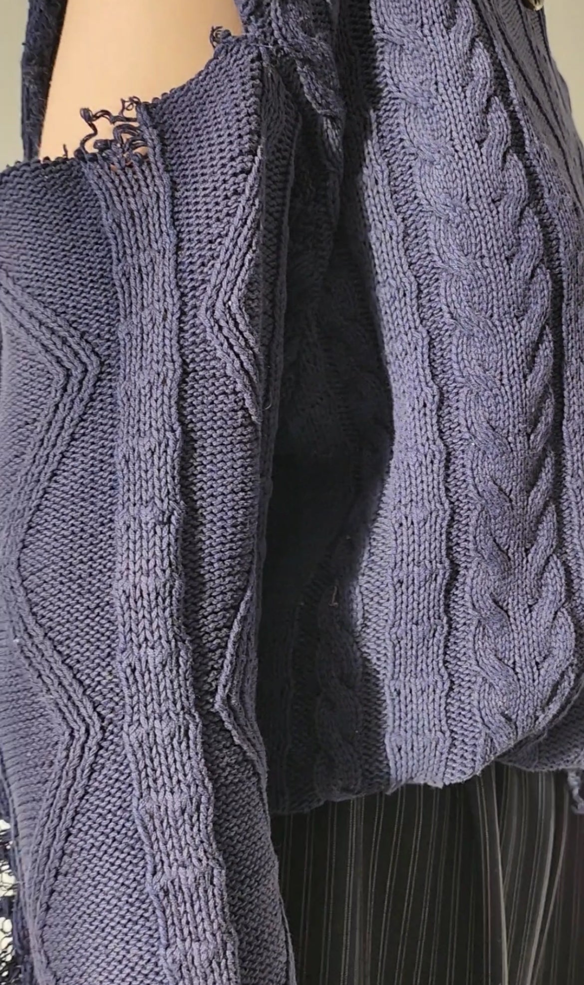 Reworked black cotton sweater with denim sleeves