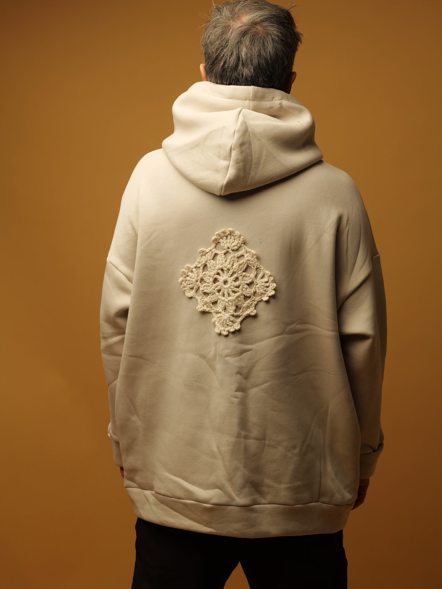White oversize hoodie with ethnic decoration