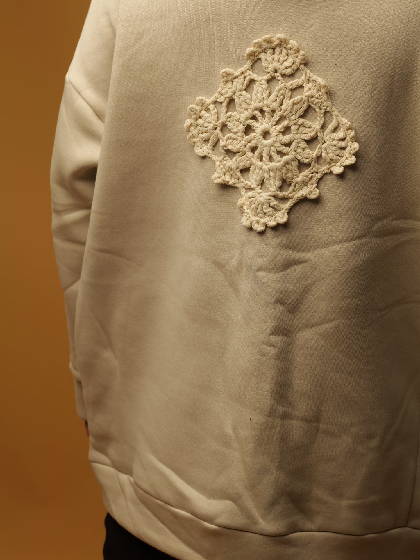 White oversize hoodie with ethnic decoration