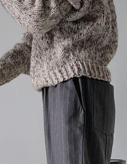 Short light melange woolen sweater