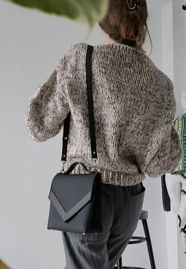 Short light melange woolen sweater
