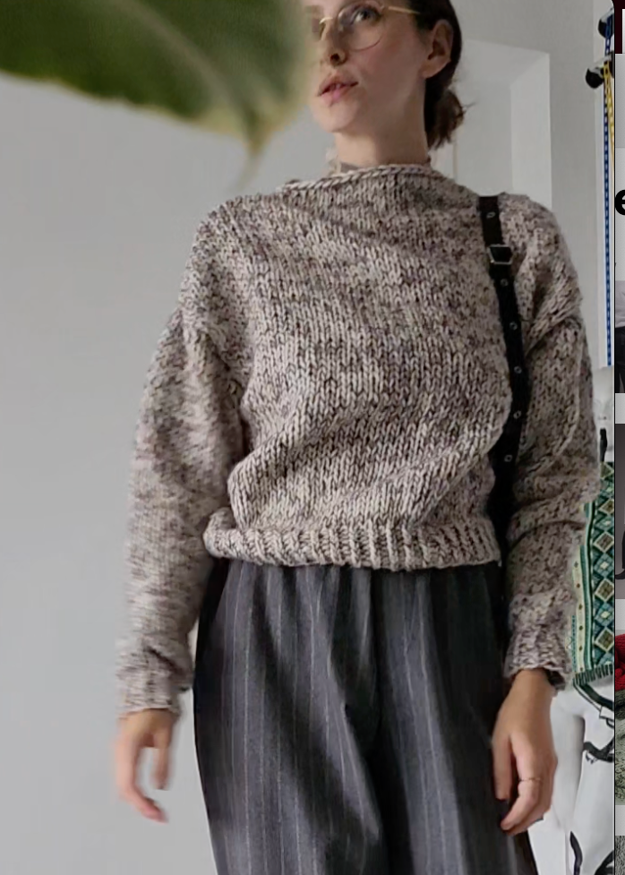Short light melange woolen sweater