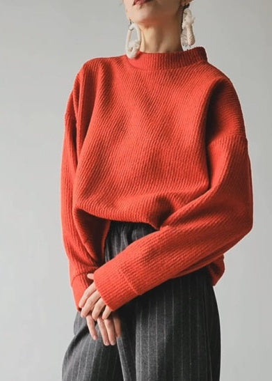 Orange-red textile trapeze sweater