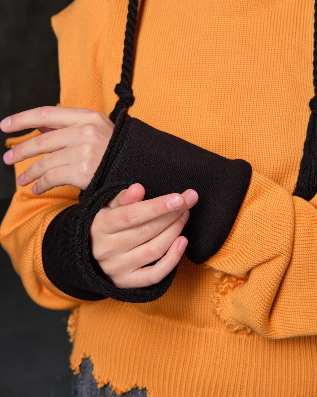 Black cotton sweater with open shoulders