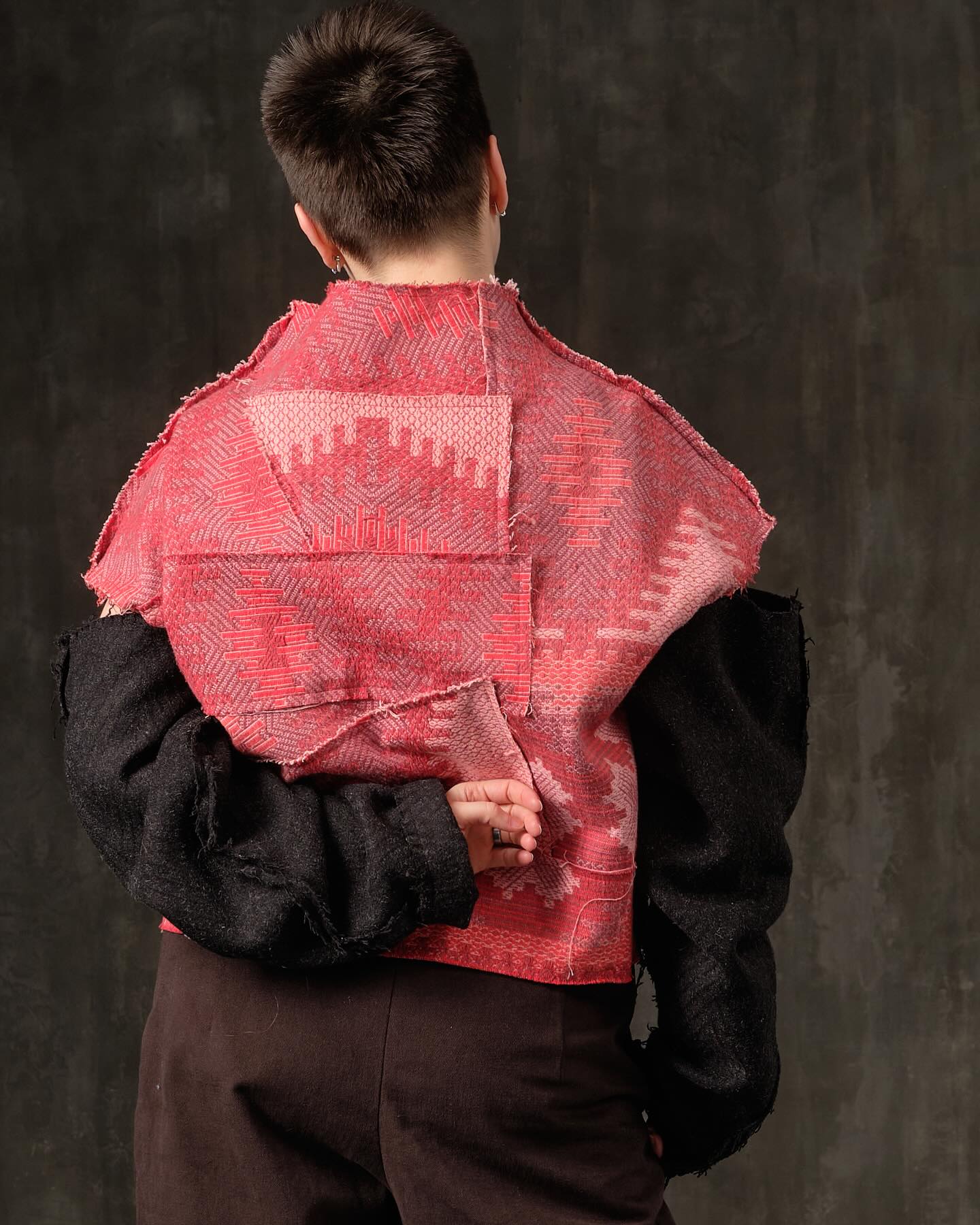 Sweater open shoulders black herringbone and red ornament