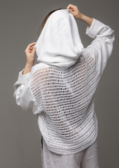 A white linen shirt with a hood and a mesh back