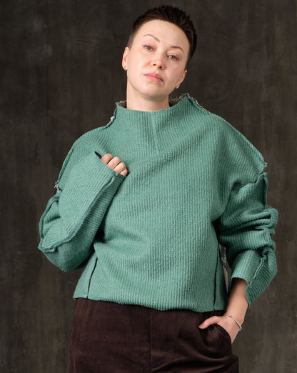 Sweater open shoulders green and ethnic rhombuses