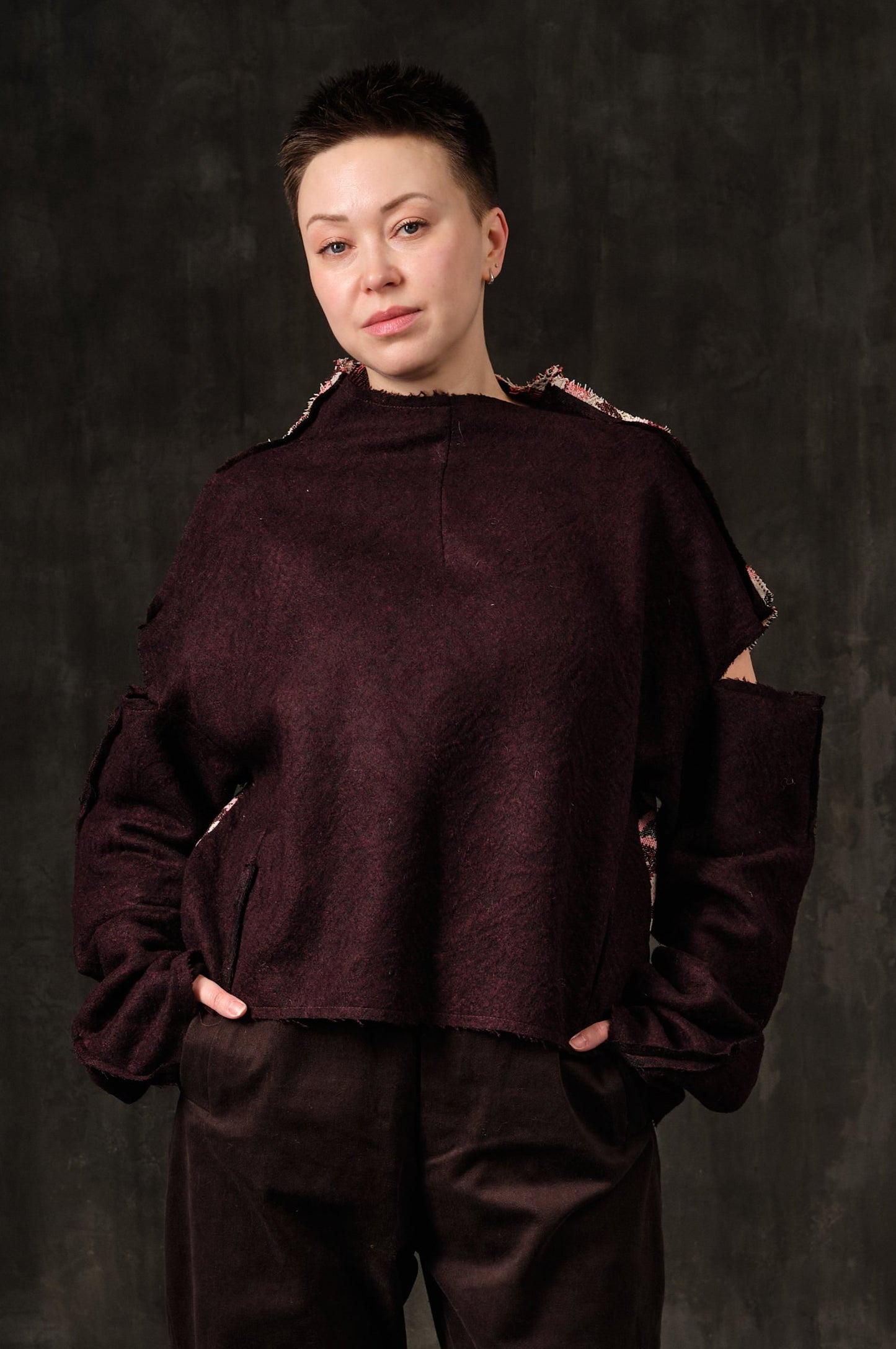 Off-shoulder burgundy wool and cargo jacquard monogram sweater