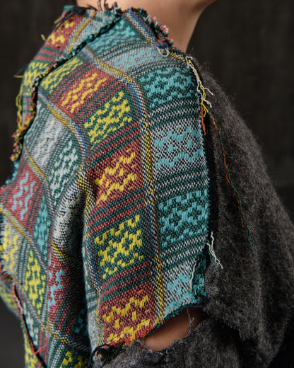 Gray and ethnic patchwork angora open shoulder sweater